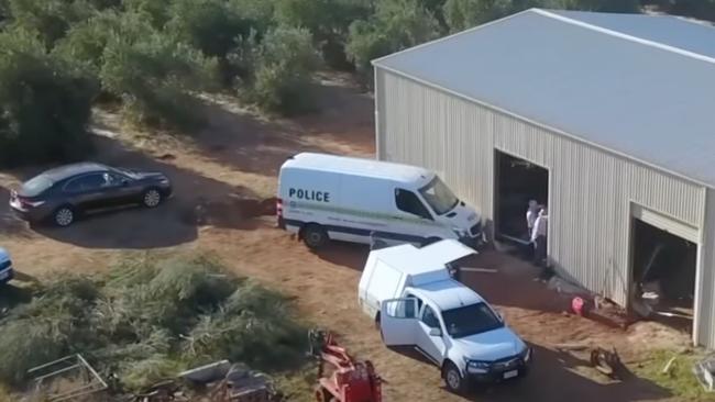 Police search the shed on the Kudla property. Picture: 7NEWS