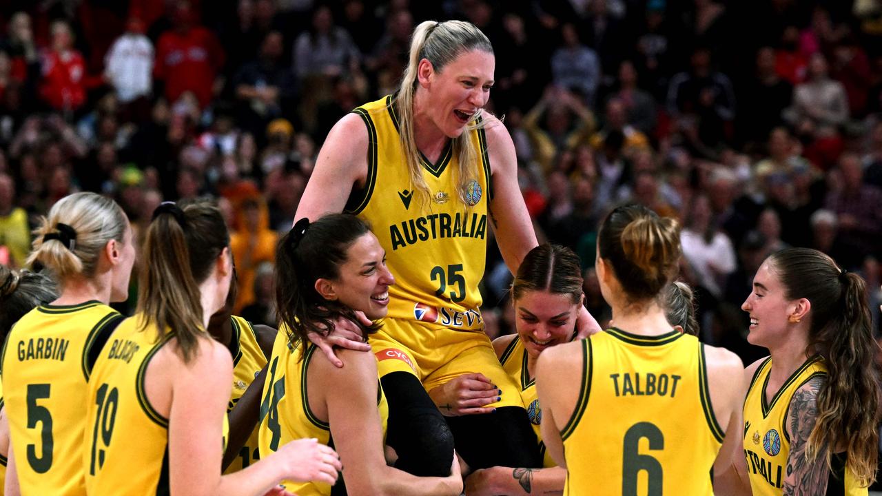 Australia's Lauren Jackson (C) is lifted in the air by teammates after victory in the 2022 Women's Basketball World Cup bronze medal game in Sydney. Photo: AFP