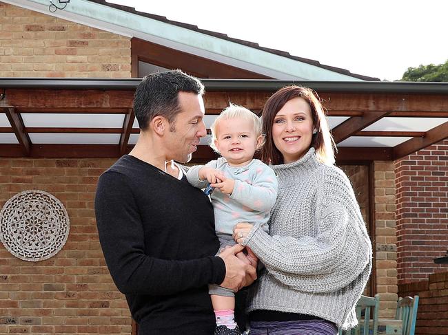 SUNDAY TELEGRAPH - Pictured at their home in Freshwater today is Ali and Stephane Lelievre with their 19 month old daughter Charlee. Picture: Tim Hunter.