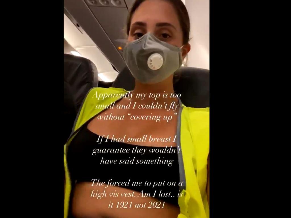 The model was given a hi-vis vest to wear on the flight, which her husband said made her look like ‘a COVID hazard’.