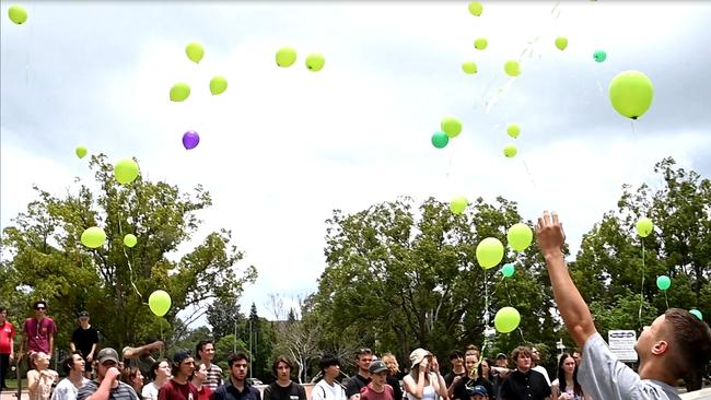 Skaters farewell Mac Allen with a balloon release.