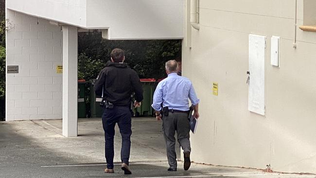 Police investigate the discovery of a man's body in an underground carpark on the Gold Coast. Picture: Adam Head