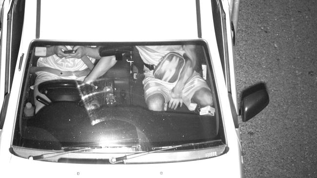 A passenger holds the wheel while a driver uses his phone. New covert cameras will be able to detect such behaviour 24 hours a day.