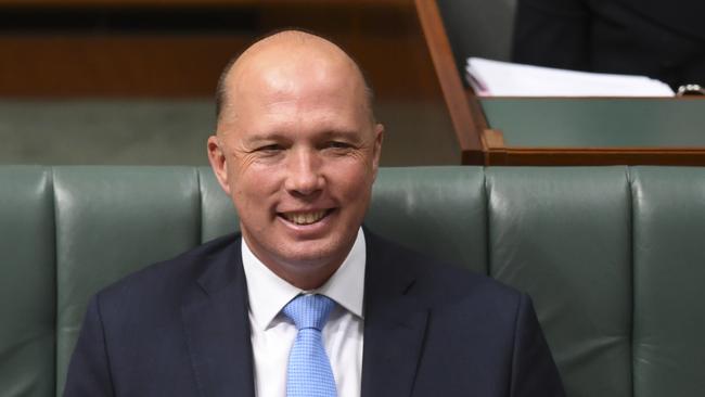 Australian Minister for Home Affairs Peter Dutton reacts during House of Representatives Question Time at Parliament House in Canberra, Monday, September 17, 2018. (AAP Image/Lukas Coch) NO ARCHIVING