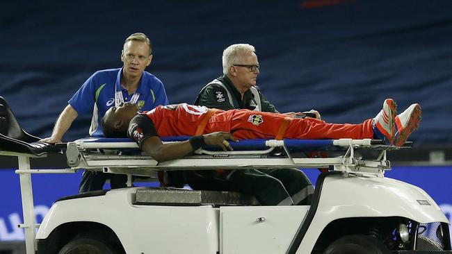 Dwayne Bravo is carted from the ground. Photo: Darrian Traynor/Getty Images