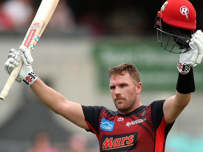 Renegades' Aaron Finch celebrates his century during the BBL match between the Sydney Sixers and Melbourne Renegades at the SCG. Picture. Phil Hillyard