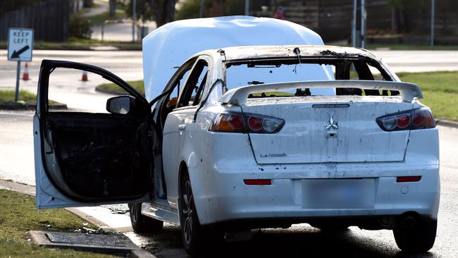A burnt out car on Carramar Drive Frankston, possibly connected to the shooting. Picture: Nicole Garmston