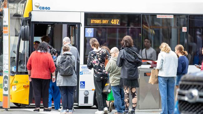 Passengers boarding a Metro bus at Franklin Square in Hobart. Picture: Linda Higginson