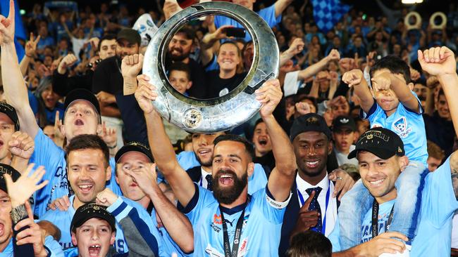 Alex Brosque holds up the A-League trophy after Sydney FC won the 2017 grand final. Picture: Mark Evans