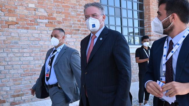 OECD general-secretary Mathias Cormann, centre, arrives for the G20 finance ministers and central bankers meeting in Venice last Friday. Picture: AFP