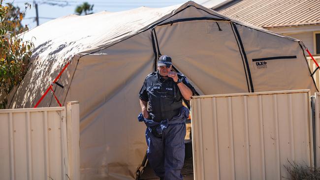 Forensics are pictured at the home where Terence Kelly lived on Saturday morning. Picture: Kelsey Reid/The West Australian