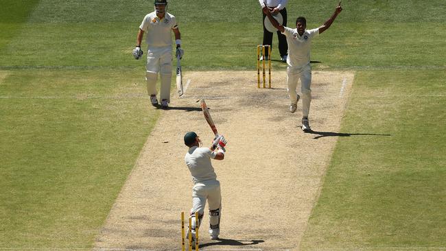 Not out! David Warner is bowled off a no-ball by Varun Aaron of India.