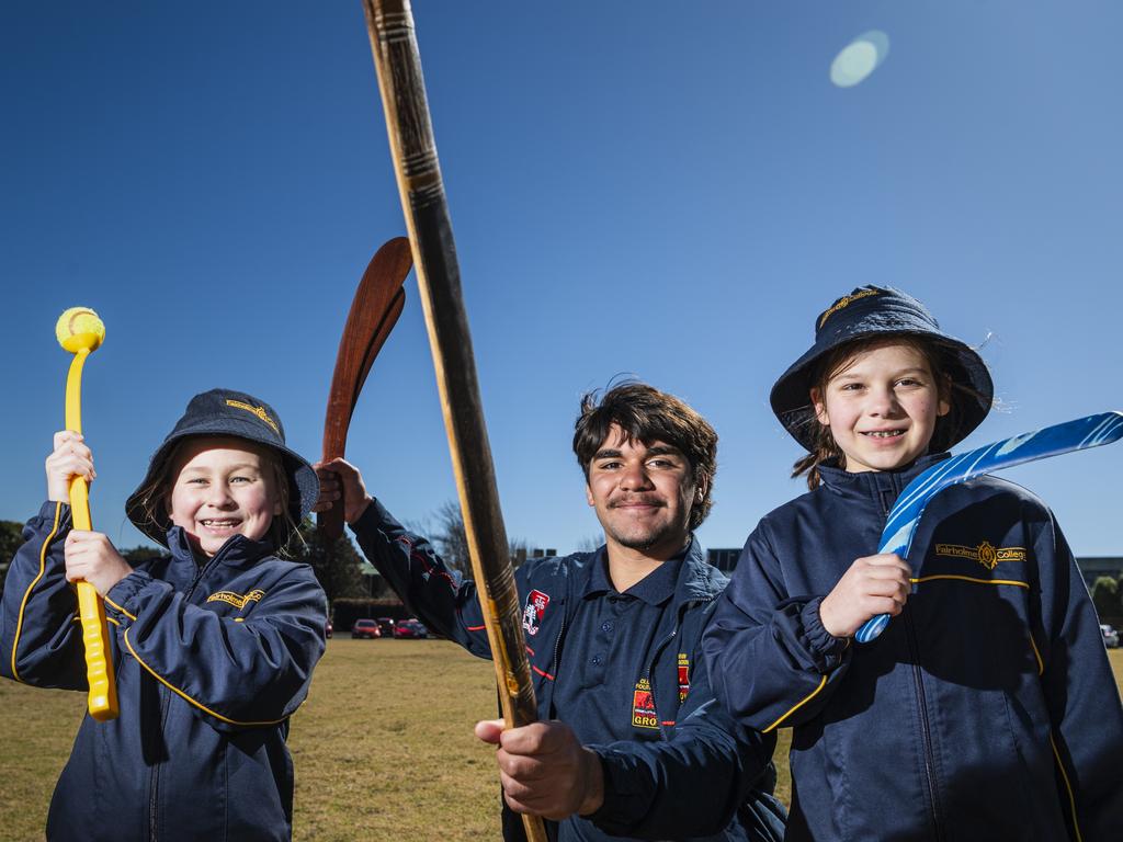 Clontarf Foundation Toowoomba State High School year 10 student Sonny Lucas talks about hunting techniques with Fairholme College year 4 students Lucy Hall (left) and Ellie Bliss. Picture: Kevin Farmer