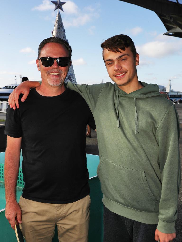 Chris and Jonah Romeyn. Locals and visitors arrived early to get a good spot for the Geelong New Years Eve celebrations. Picture: Alan Barber