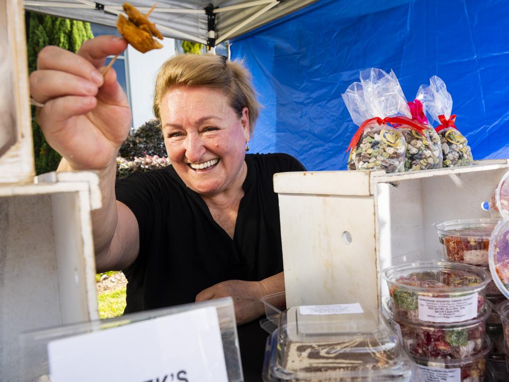 Melek Onugoren boasts she has the best baklava in Queensland at her Melek's Baklava and More stall at Locals 4 Locals summer edition on the lawn of Empire Theatres, Friday, February 18, 2022. Picture: Kevin Farmer