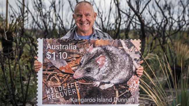 Peter Hammond with an oversized postage stamp featuring his photograph of the Kangaroo Island dunnart. Picture: Sean McGowan