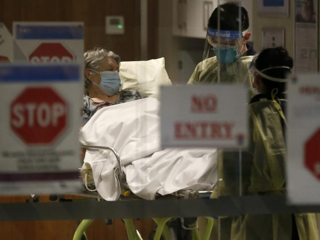 A resident of Epping Gardens Aged Care Facility, Melbourne is taken away in an ambulance on July 28, 2020. Picture: Darrian Traynor/Getty Images