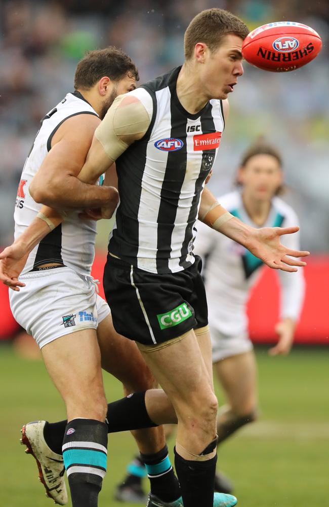 Mason Cox is held back by Paddy Ryder. Picture: Alex Coppel