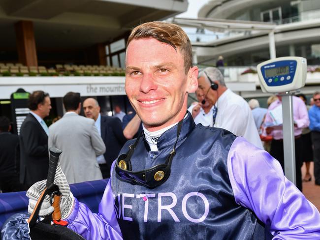 Jockey Ben Melham returns to scale after riding Chicago Cub to victory in race 5, the Qms Sprint, during the Flemington Twilight Races at Flemington Racecourse in Melbourne, Sunday, February 9, 2020. (AAP Image/Vince Caligiuri) NO ARCHIVING, EDITORIAL USE ONLY