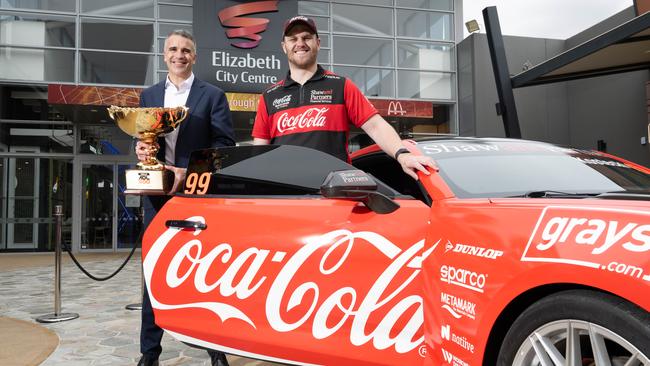 Premier of South Australia Peter Malinauskas and Supercars Championship leader Brodie Kostecki with a supercar at Elizabeth City Centre ahead of the Adelaide 500. Picture: NCA NewsWire / Morgan Sette