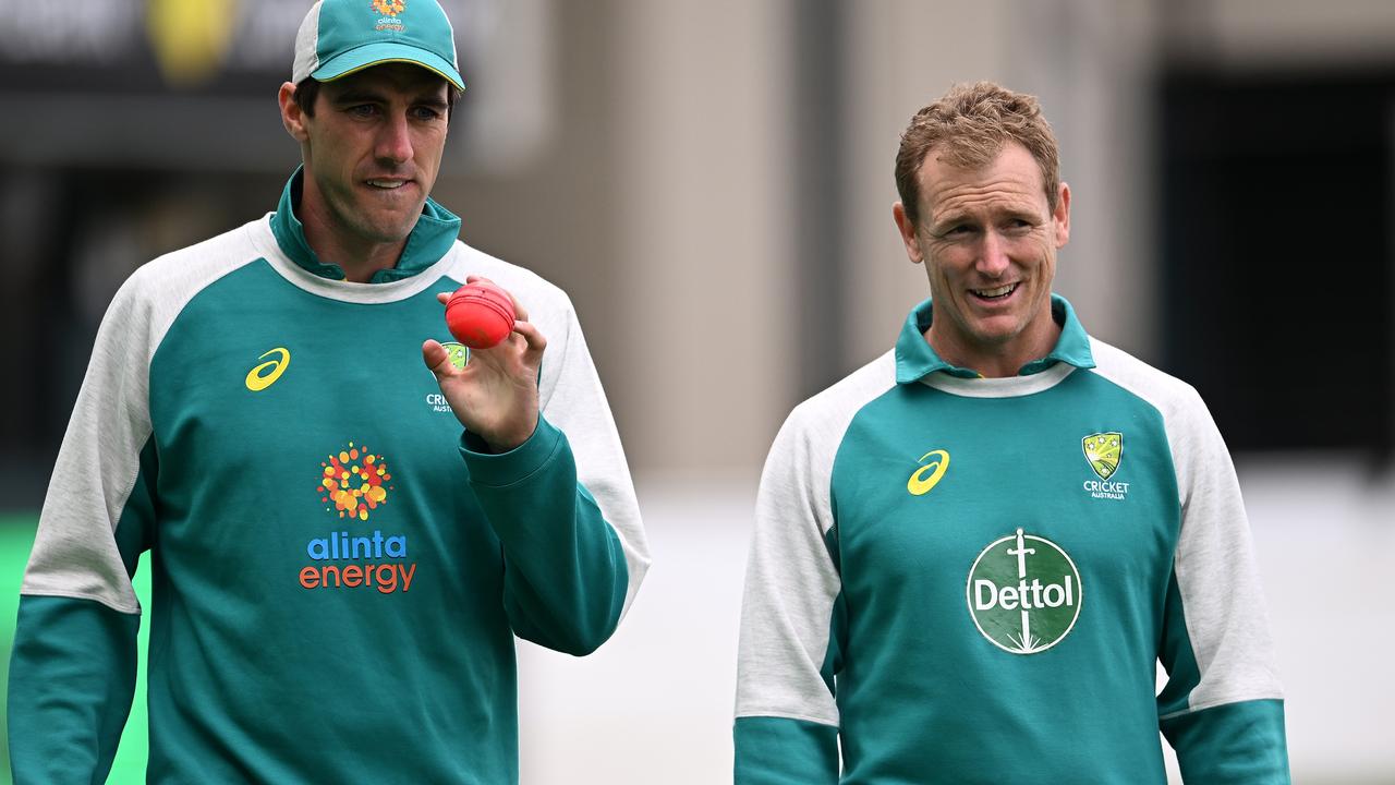 Pat Cummins and George Bailey. (Photo by Steve Bell/Getty Images)