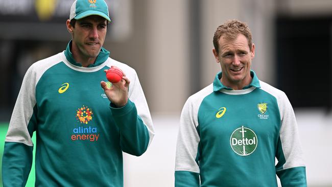 Pat Cummins and George Bailey. (Photo by Steve Bell/Getty Images)