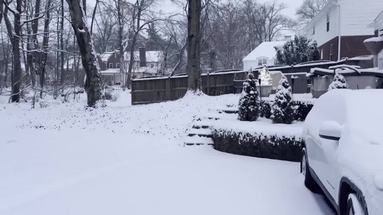 Winter storm buries Cincinnati as cold front hits Midwest