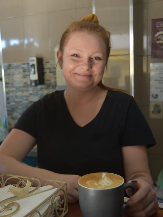 Alidiya Averillo serves up a coffee at The Decks on Mary Cafe and Restaurant before dine-in restrictions. They have now switched to takeaway service.