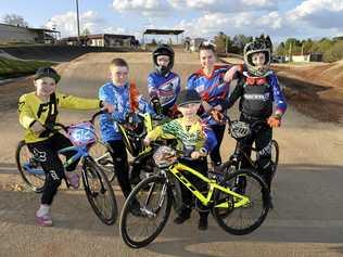 READY TO RIDE: Toowoomba BMX Club members (from left) Deanna Kampf, Travis Lord, Bodhi Hart, Maddie Groves, Andrew Burke and (front) Braxton Behrendt are busy preparing for the Queensland BMX titles in Brisbane next week. Picture: Kevin Farmer