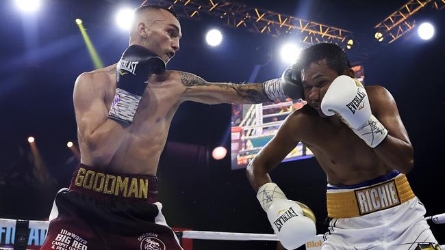 Sam Goodman laid out Richie Mepranum to a raucous response from the crowd. Picture: Getty Images