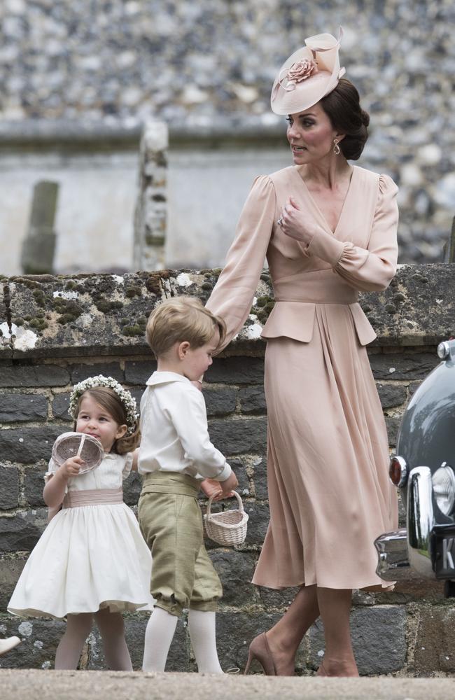 Catherine, Duchess of Cambridge, with Prince George and Princess Charlotte at her sister’s wedding in May 2017. Picture: Arthur Edwards — WPA Pool/Getty Images.