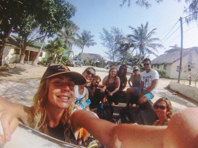 Elly Warren with a picture of her enjoying her time in Mozambique. Picture : Ian Currie