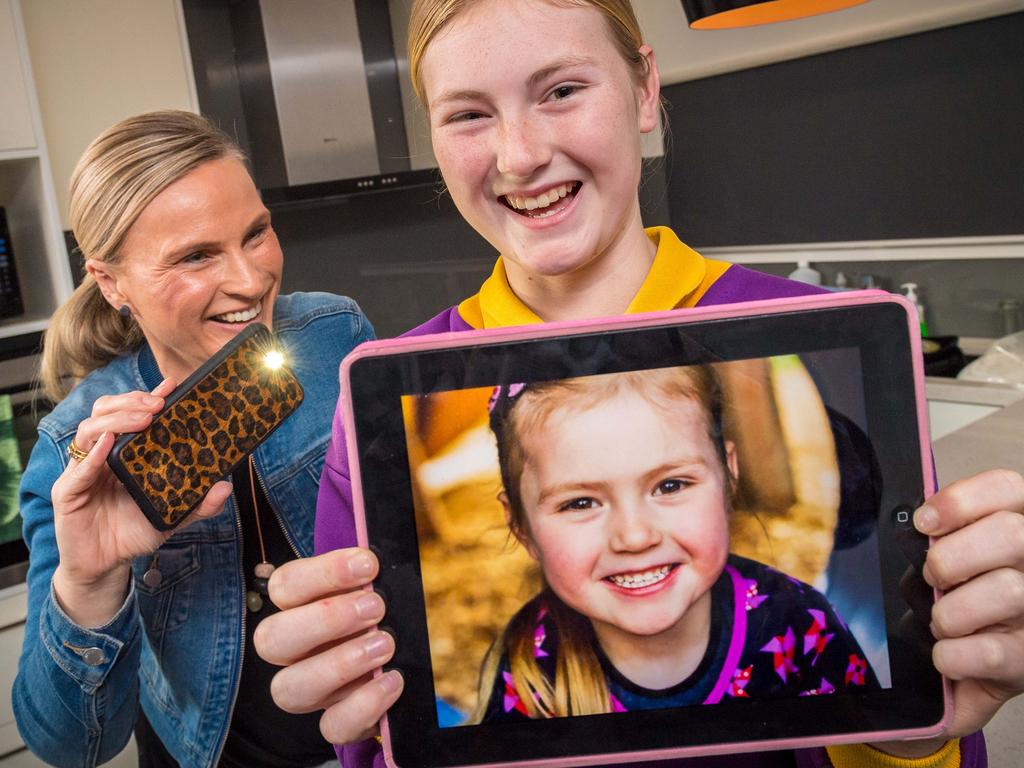 Kylie Capron shows off a picture of her daughter Ruby,11, when she was a toddler. The first generation of truly digital natives, dubbed Òscreenagers,Ó will graduate primary school this year but experts say technology is not necessarily making their lives easier. Picture: Jake Nowakowski