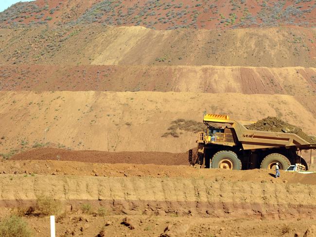 Haulage truck at the Rio Tinto West Angelas iron ore mine in the Pilbara region of West Australia Wednesday, July 9, 2014.  (AAP Image/Alan Porritt) NO ARCHIVING