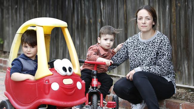 Michelle Grigoriadis, with her sons Maverick, 3, and Archer, 1, is an ICU nurse who has been off work for six weeks because she can't get childcare. Picture: David Caird