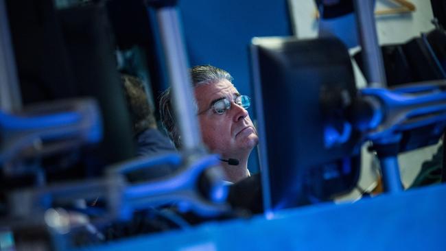 NEW YORK, NY - JUNE 24: A trader works on the floor of the stock exchange during the afternoon of June 24, 2015 in New York City. The Dow Jones Industrial Average plunged more than 150 points during debates over Greece's bailout. Andrew Burton/Getty Images/AFP == FOR NEWSPAPERS, INTERNET, TELCOS & TELEVISION USE ONLY ==