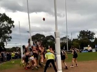 Players on the goal line in the EFL Division 2 grand final.