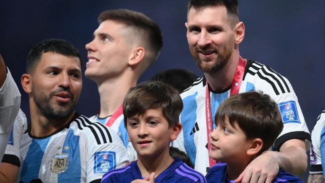 Lionel Messi and Sergio Aguero (left) after Argentina’s victory over France.