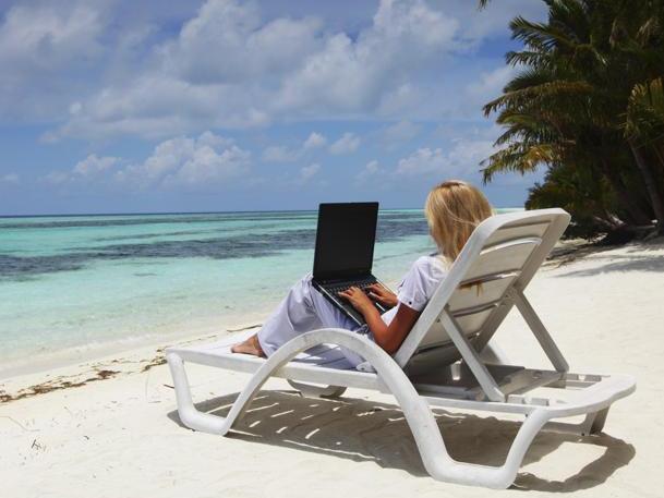 tropical business woman with laptop