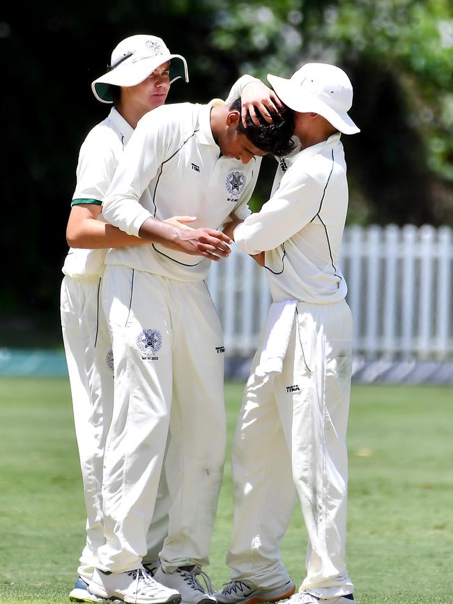 Brisbane Boys College spinner Javen D’souza is congratulated. Picture, John Gass