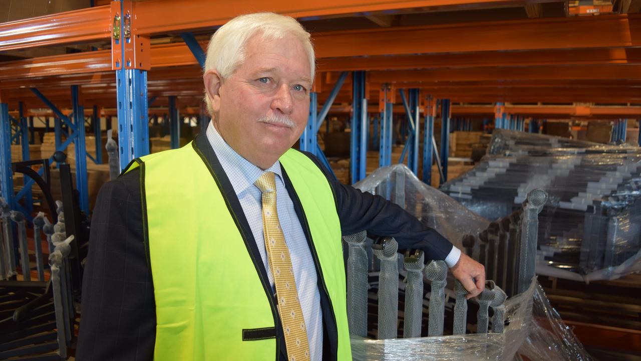 BizFurn founder Denis Moore celebrates the opening of a new  7,500sqm building at the company's Yandina base.