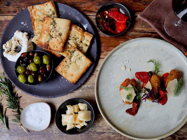 Cucinetta’s herb and garlic flatbread with olives. Picture: Jenifer Jagielski