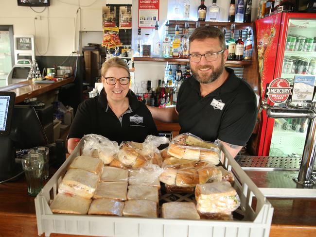 Linda and Matthew Rudd from the local Batlow pub stayed to help other residents who remained to defend their homes. Picture: Rohan Kelly