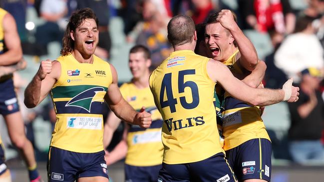 Eagles Patrick Giuffereda, Ryan Mansell and Jordan Foote celebrate. Picture: Sarah Reed