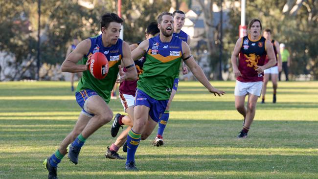 Judd Morris, of Golden Grove, takes on SMOSH West Lakes at Harper's Field last Saturday.