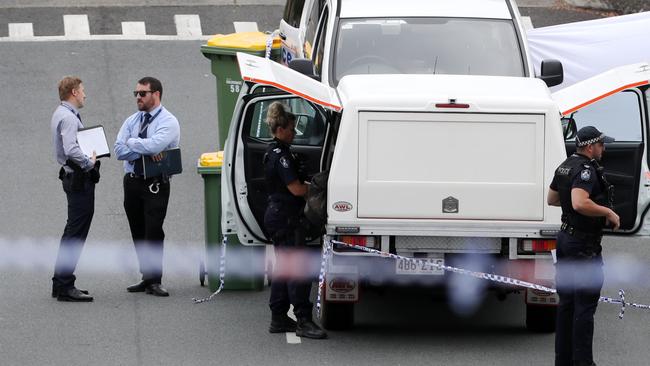 Police at the scene on Whiting St, Labrador. Picture: Nigel Hallett