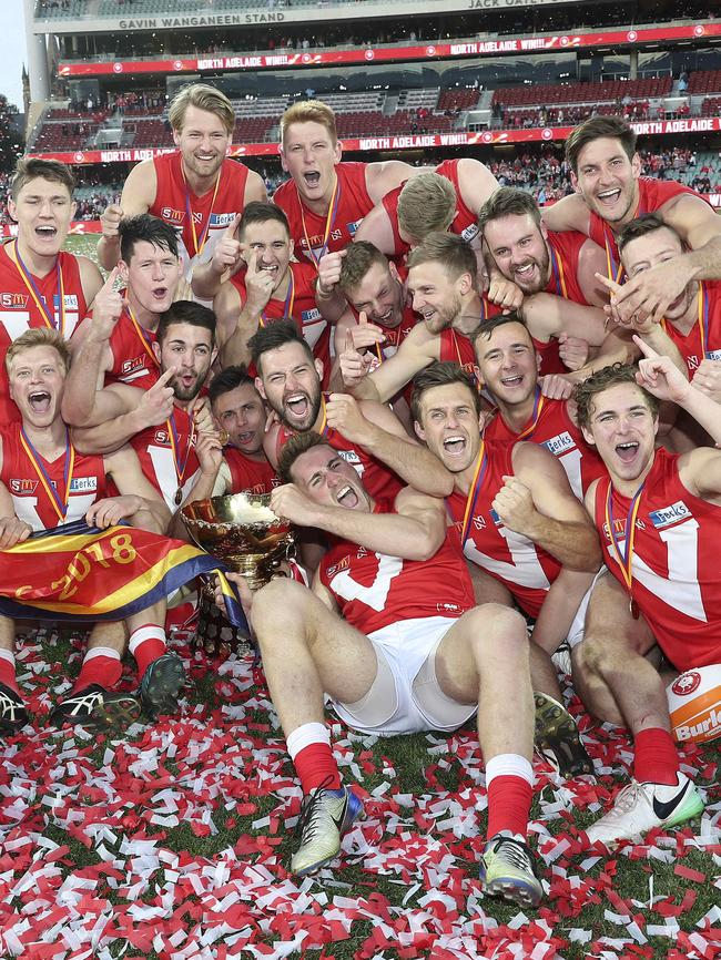 The victorious North Adelaide side after the win. Picture Sarah Reed