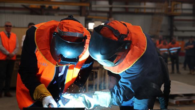 Workers at the Tomago Aluminium Smelter, which could face brownouts if Eraring closes with no viable alternative. Images supplied by Adam Taylor/PMO