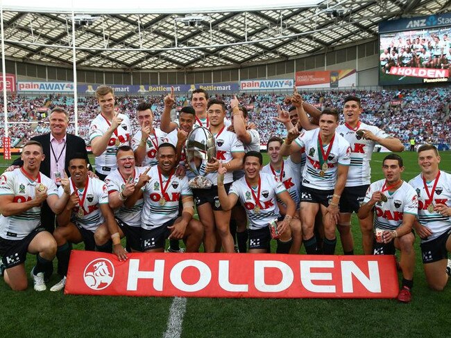 SYDNEY, AUSTRALIA - OCTOBER 06:  The Panthers celebrate winning the 2013 Holden Cup Under 20's Grand Final match between the New Zealand Warriors and the Penrith Panthers at ANZ Stadium on October 6, 2013 in Sydney, Australia.  (Photo by Matt King/Getty Images)