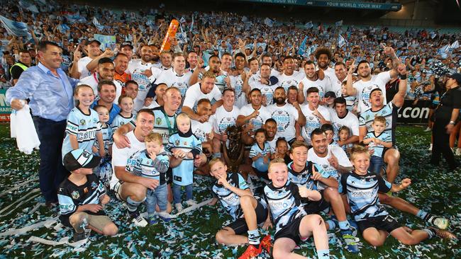 SYDNEY, AUSTRALIA - OCTOBER 02: The Sharks team pose for a team photo as they celebrate victory after the 2016 NRL Grand Final match between the Cronulla Sharks and the Melbourne Storm at ANZ Stadium on October 2, 2016 in Sydney, Australia. (Photo by Mark Kolbe/Getty Images)